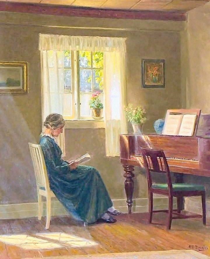 Elderly woman in blue dress reading by window in room with piano