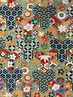 Colorful Japanese-style geometric pattern with hexagons, flowers, and leaf motifs