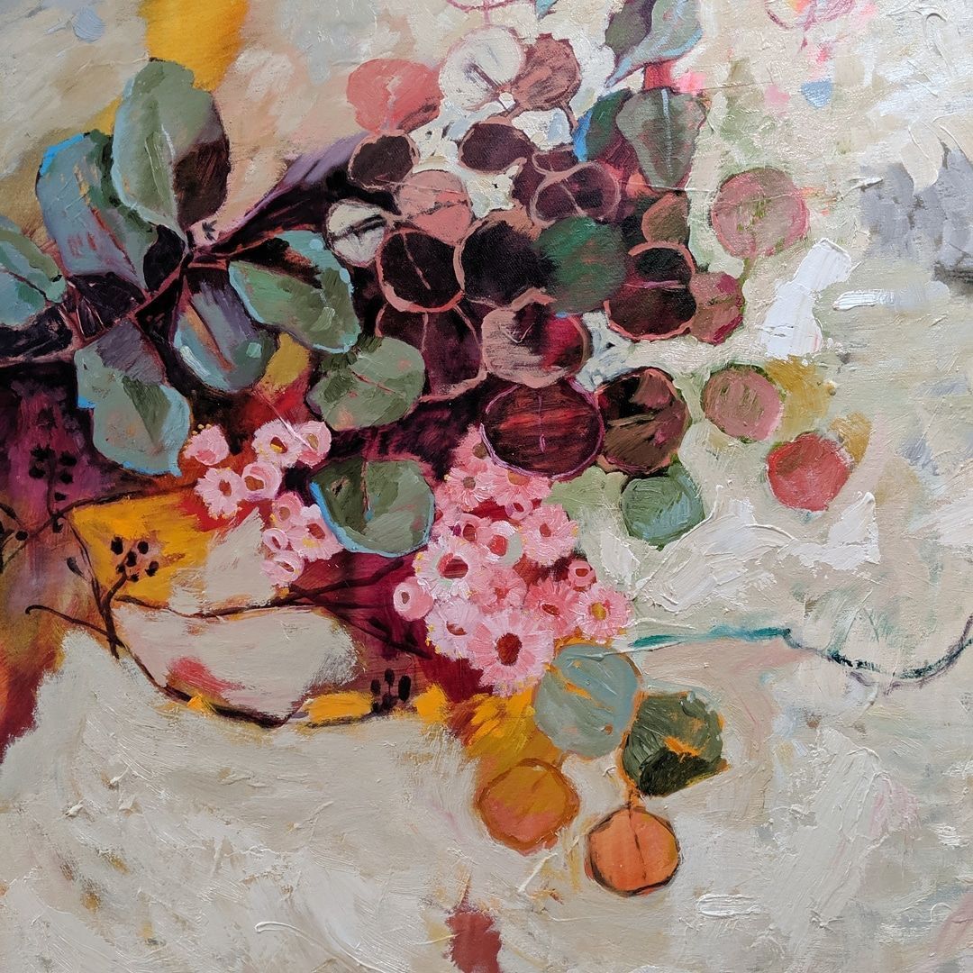 Abstract painting of pink and burgundy flowers with green leaves on textured cream background