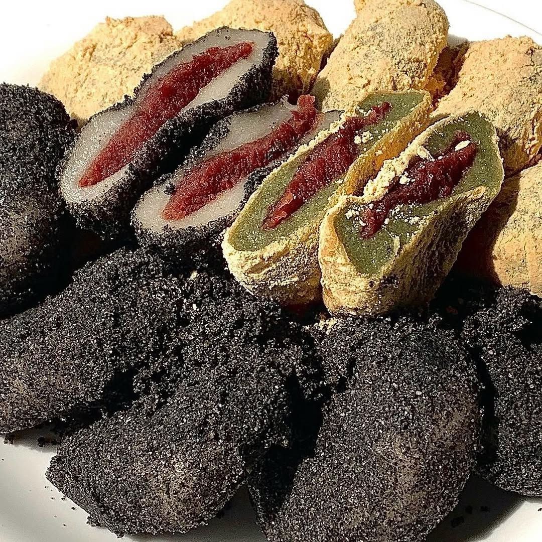 Assorted Japanese mochi with red bean filling coated in black sesame and kinako powder