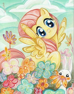 Cartoon pony with pink mane, yellow coat, and large blue eyes among colorful flowers and butterflies