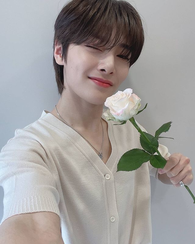 Young Man with Rose