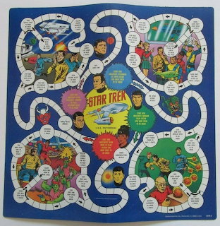 Vintage Star Trek board game with winding track and illustrated scenes on a blue board