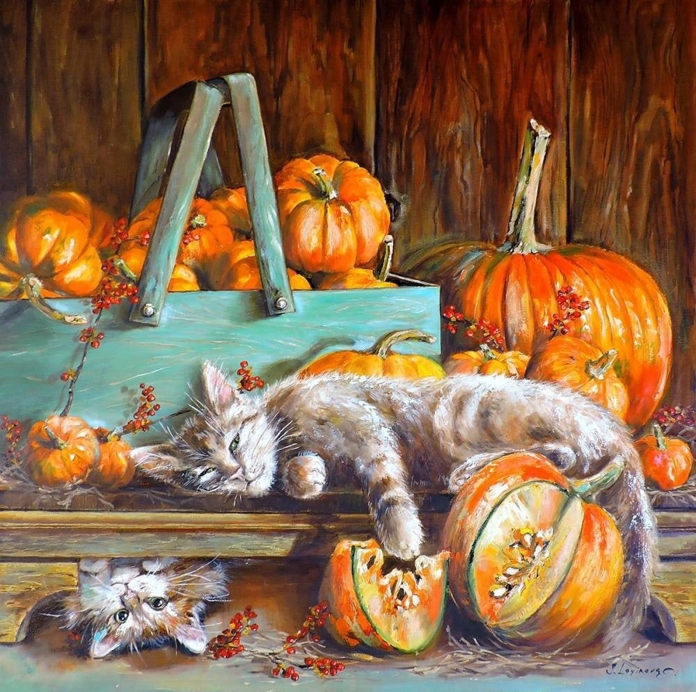 Two tabby cats lounging with orange pumpkins on a turquoise bench in an autumn setting