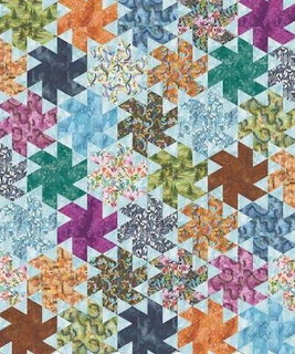 Colorful patchwork quilt with geometric star pattern blocks in various printed fabrics