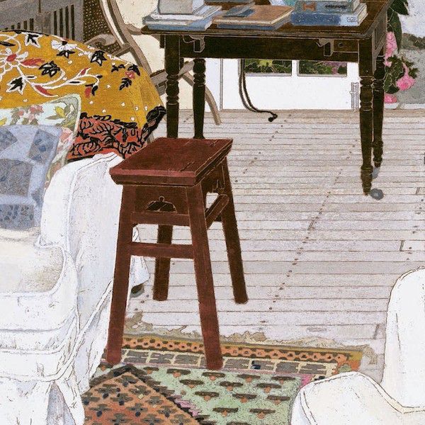 Wooden stool in vintage room with antique furniture and decorative accents
