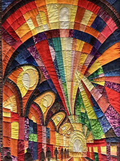 Vibrant abstract mosaic with radiating rainbow arches in geometric patterns