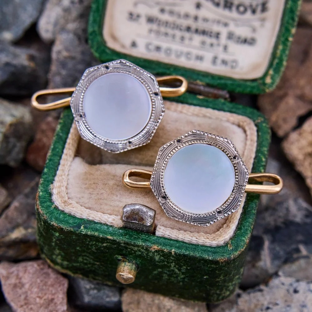 Pair of vintage gold cufflinks with moonstone centers in green velvet box