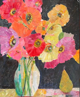 Colorful poppy flowers in a vase painting with pear on table