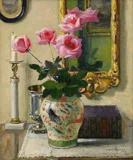 Oil painting of pink roses in ornate vase beside gilt mirror and candlestick on lace tablecloth