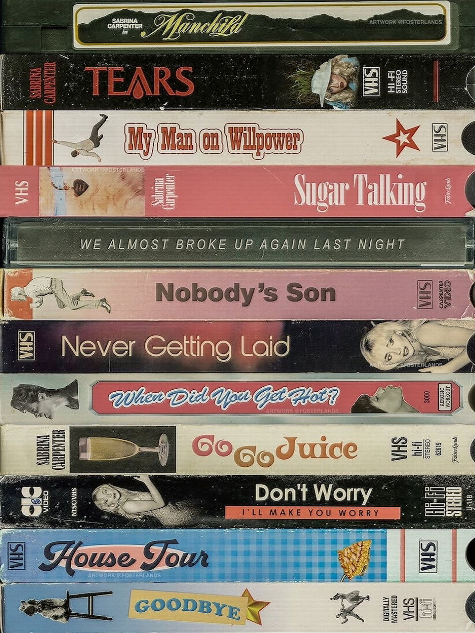 Pile of vintage VHS tapes with handwritten labels