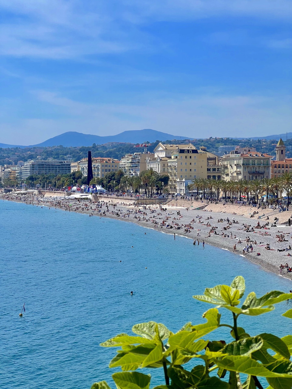 Coastal view of Nice France with Mediterranean sea, beach and city skyline