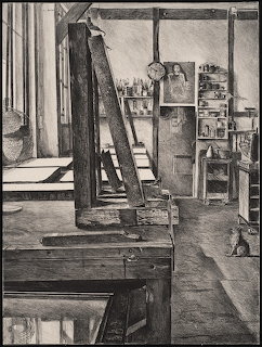Black and white photo of an artist's studio with easel, ladder, shelves and work table
