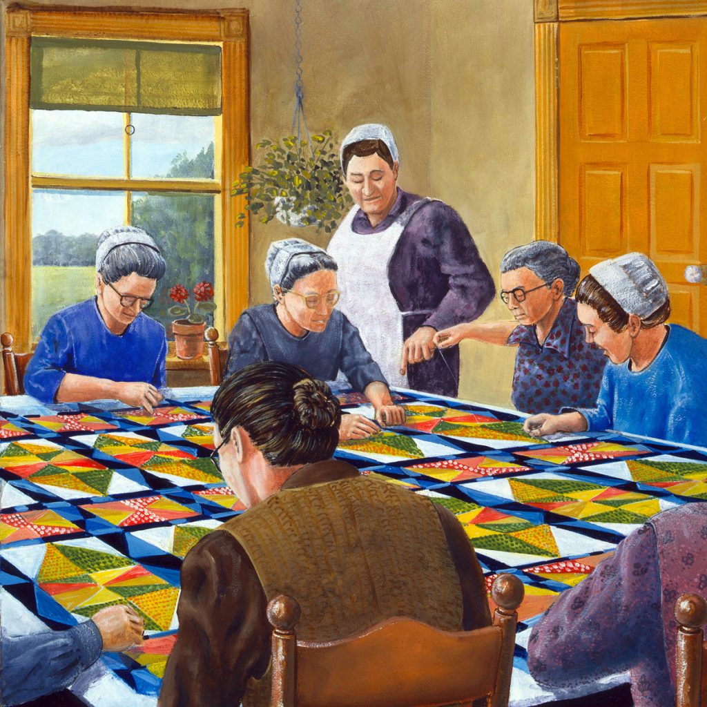 Amish women quilting together around a table with a vibrant patchwork quilt