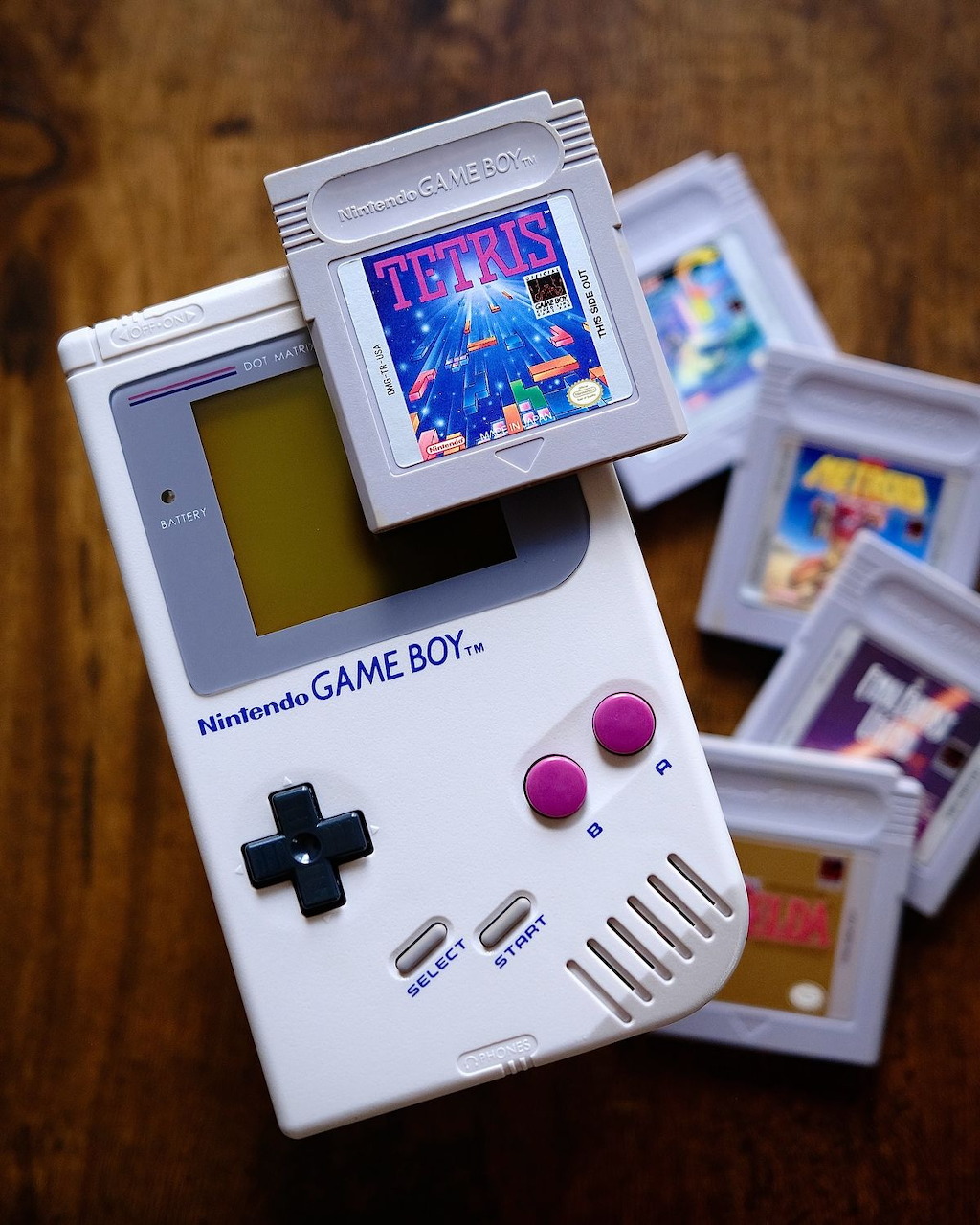 Original gray Game Boy handheld console with D-pad and A/B buttons