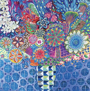 Decorative vase with intricate geometric patterns filled with colorful stylized flowers and mandala designs