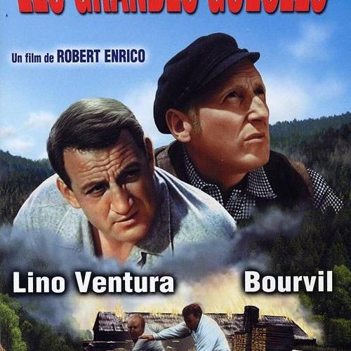 Vintage French movie poster showing two male actors with mountain scenery and text overlay