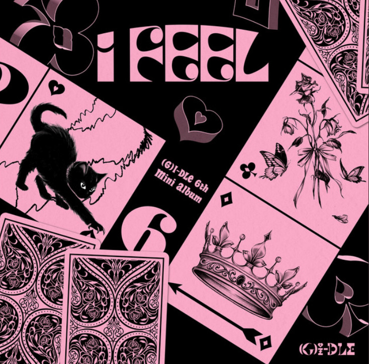 Pink and black album cover with playing cards, black cat illustration, crown and text reading I Feel
