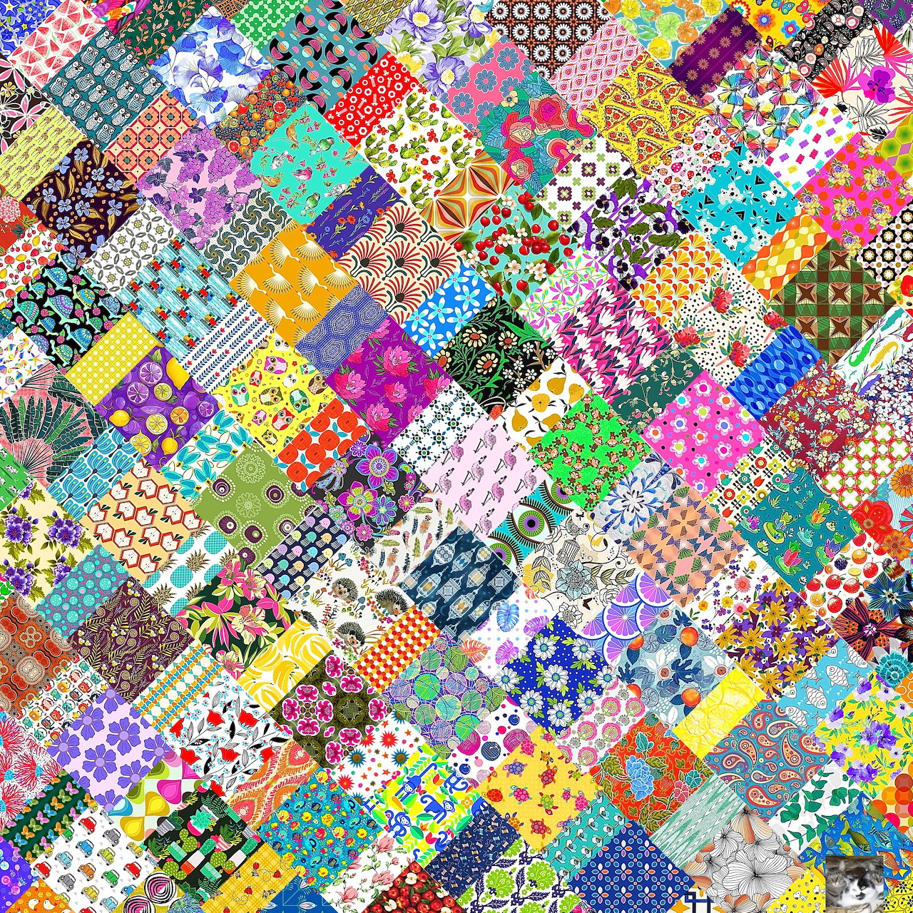 Colorful patchwork quilt with diverse pattern squares in rainbow colors
