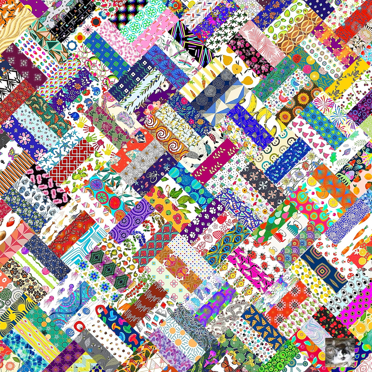 Colorful patchwork quilt with mixed fabric patterns including flowers, dots, checks, and stripes in bright colors