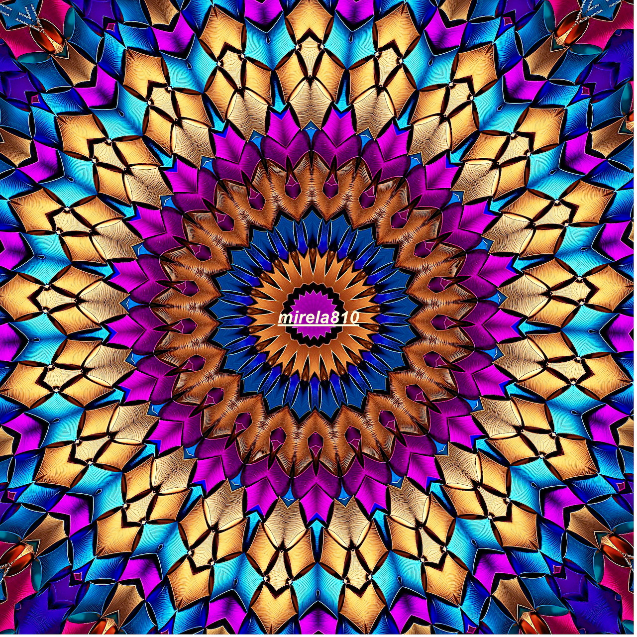 Colorful symmetrical mandala with stained glass pattern in blue, magenta, orange and turquoise radiating from center