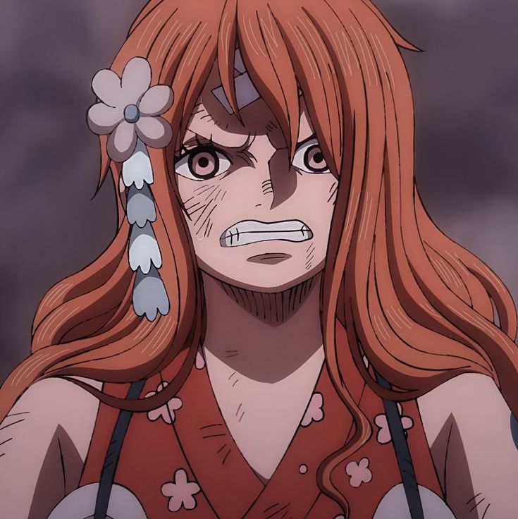Anime character Nami with orange hair, white flower hair accessories, and distressed facial expression