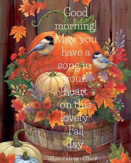 Chickadees on pumpkins in a barrel with autumn leaves and sunflowers against a wooden fence