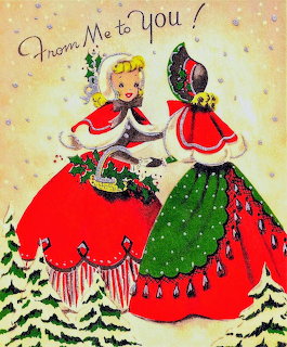 Vintage Christmas card with two women in elaborate red and green Victorian gowns holding decorated wreaths