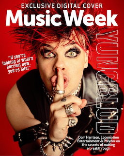 Music Week magazine cover with Yungblud showing red spiked hair, black jacket, and tongue out
