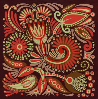 Folk art pattern with stylized flowers and paisley in warm red and gold tones