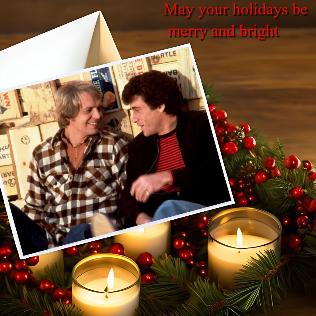 Holiday-themed image with lit candles, pine branches, red berries, and an inset photo of two men