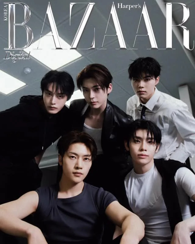 Five young men from K-pop group ZEROBASEONE posing for Harper's Bazaar magazine in black and white styling
