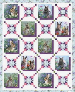 Patchwork quilt with vintage rabbit illustrations and pink star blocks