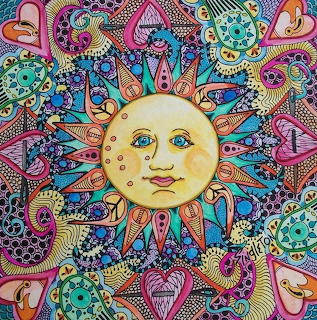 Colorful illustrated sun face surrounded by hearts, swirls, and intricate patterns