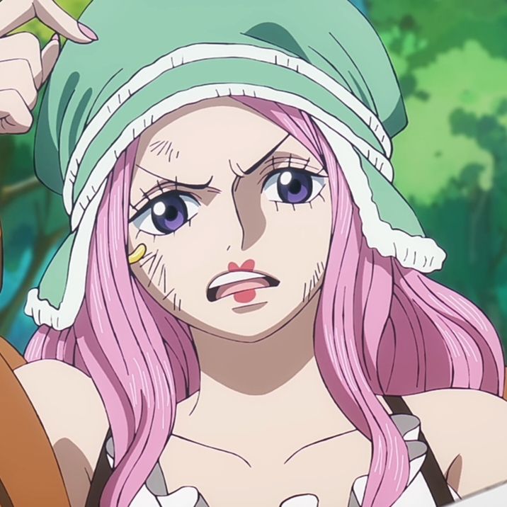 Pink-haired anime girl with teal head covering and blue eyes looking determined