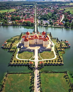 Moritzburg Castle reflected in lake, Saxony, Germany