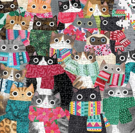 Colorful illustration of many patchwork cats with big eyes and patterned clothes