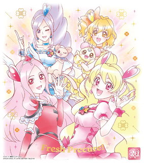 Four Fresh Precure anime girls in pink, yellow, red and white cure outfits with small mascot creatures