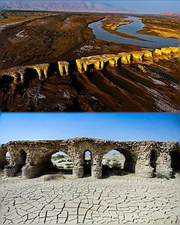 Old multi-arch stone bridge over a river in Turkey