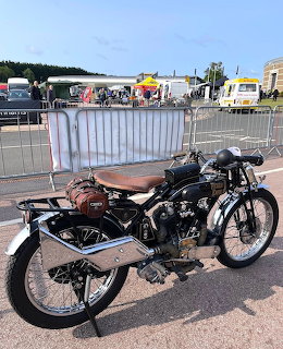 Black 1927 Vickers Enfield 1000 V-twin vintage motorcycle displayed outdoors at event