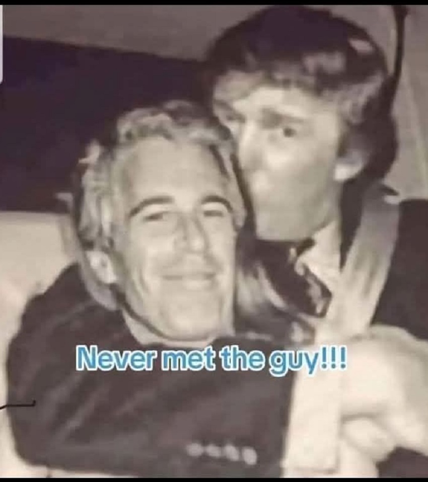 Black and white photograph of two men posing together with text overlay reading 'Never met the guy!!!'