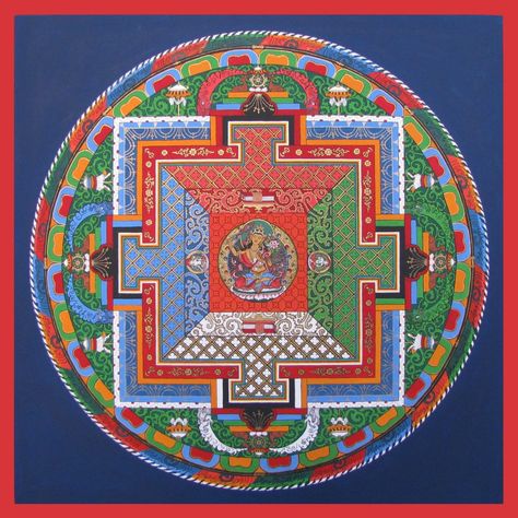Colorful traditional Tibetan mandala with central deity, geometric patterns, and decorative border on dark blue background