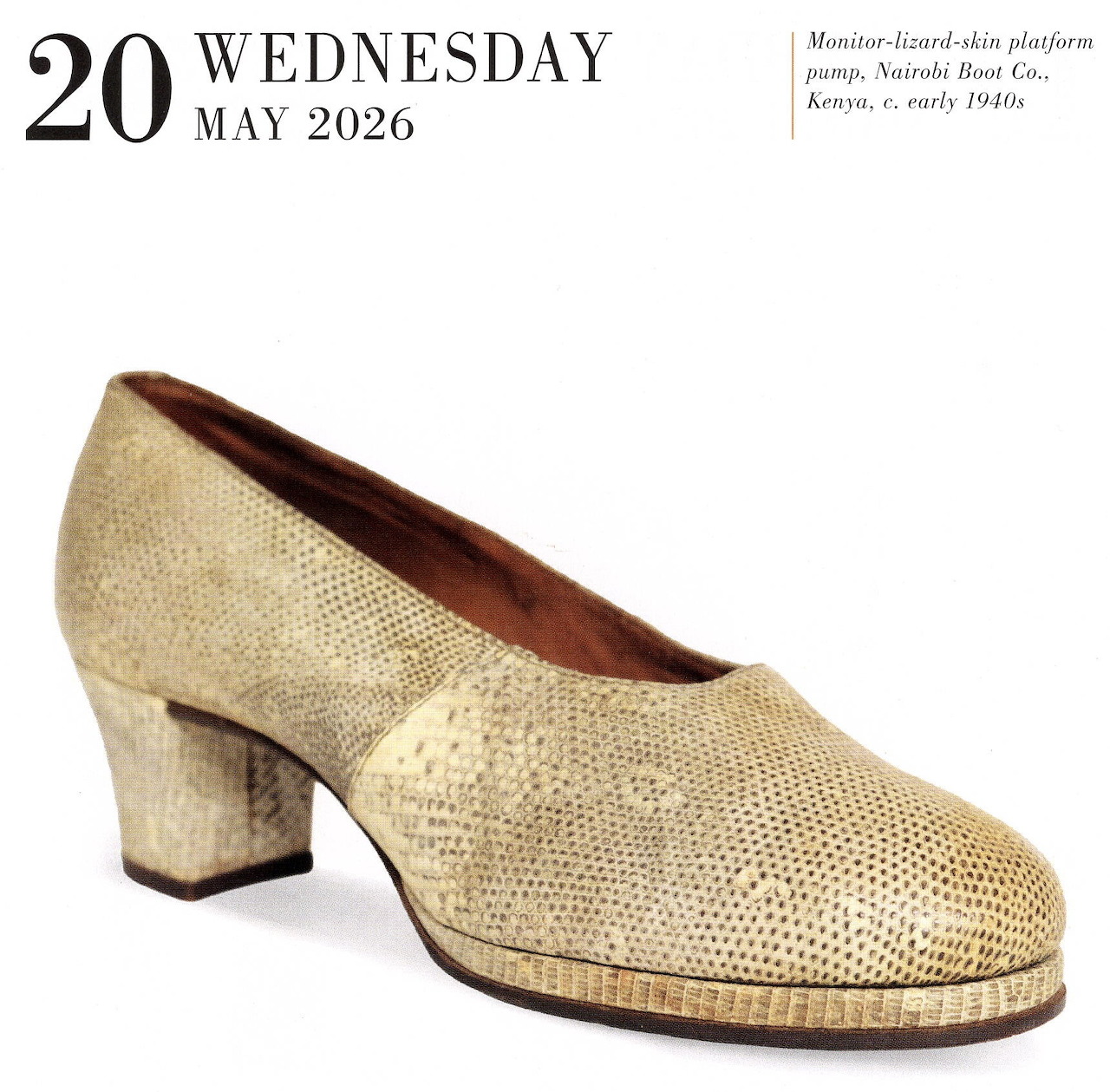 Single vintage gold heeled shoe on a white background with calendar text above