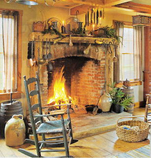 Rustic living room with stone fireplace and rocking chair