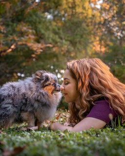 Redhead With Puppy