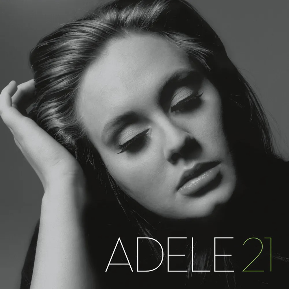 Black-and-white close-up portrait of Adele on the 21 album cover