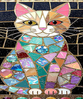 Colorful mosaic cat with geometric stained glass pattern in vibrant colors
