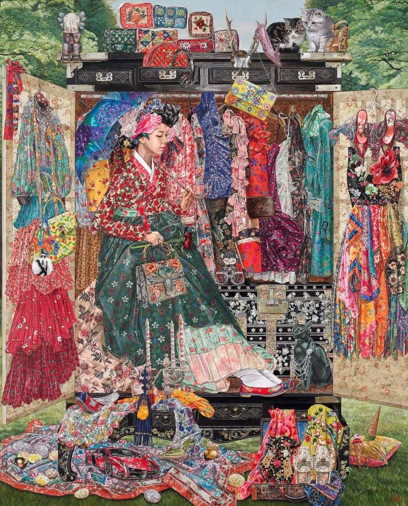 Dense collage of colorful bohemian tapestries, textiles, and decorative objects arranged in layered display