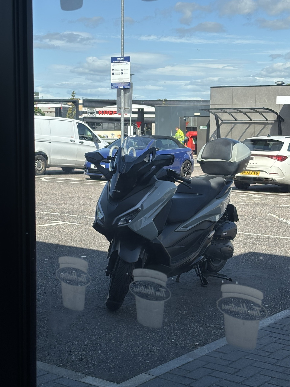 Honda car parked at a Tim Hortons coffee shop