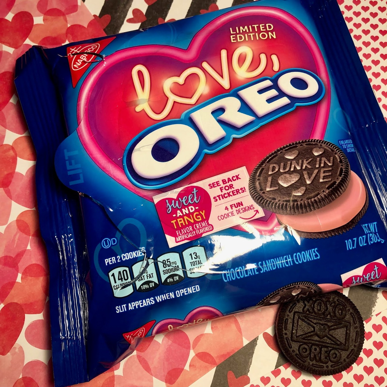 Love Oreo limited edition package with heart design and cookies on patterned background